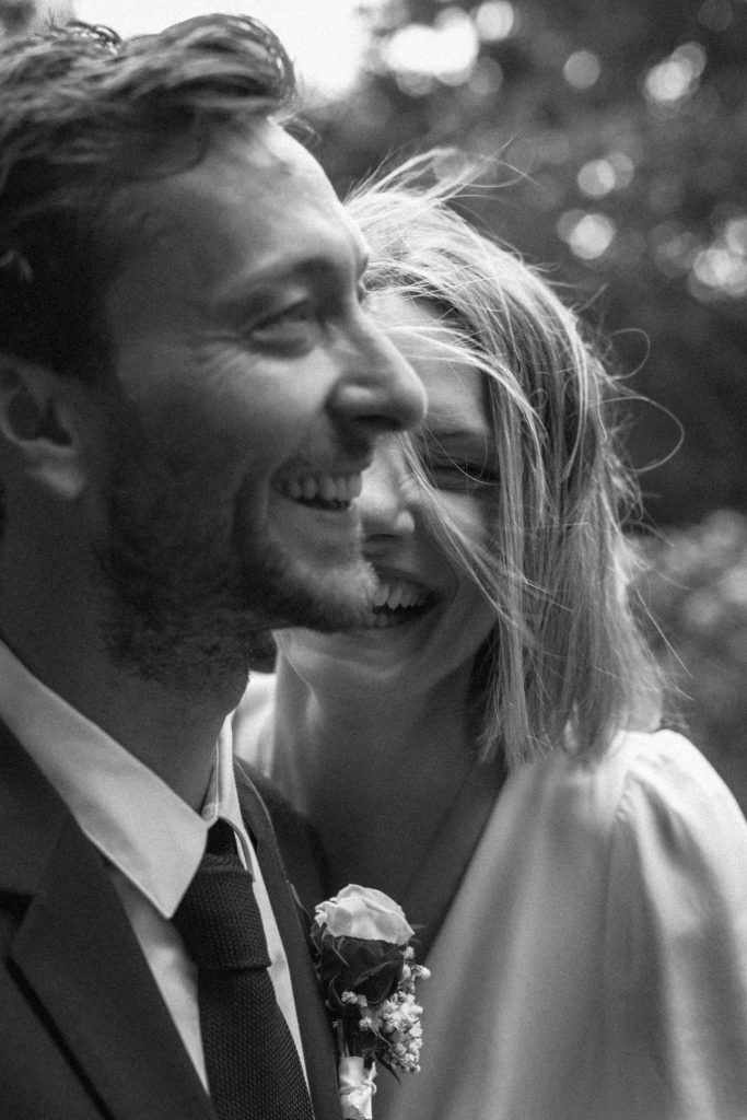 candid emotional wedding moment in provence couple laughing natural photography invisible direction