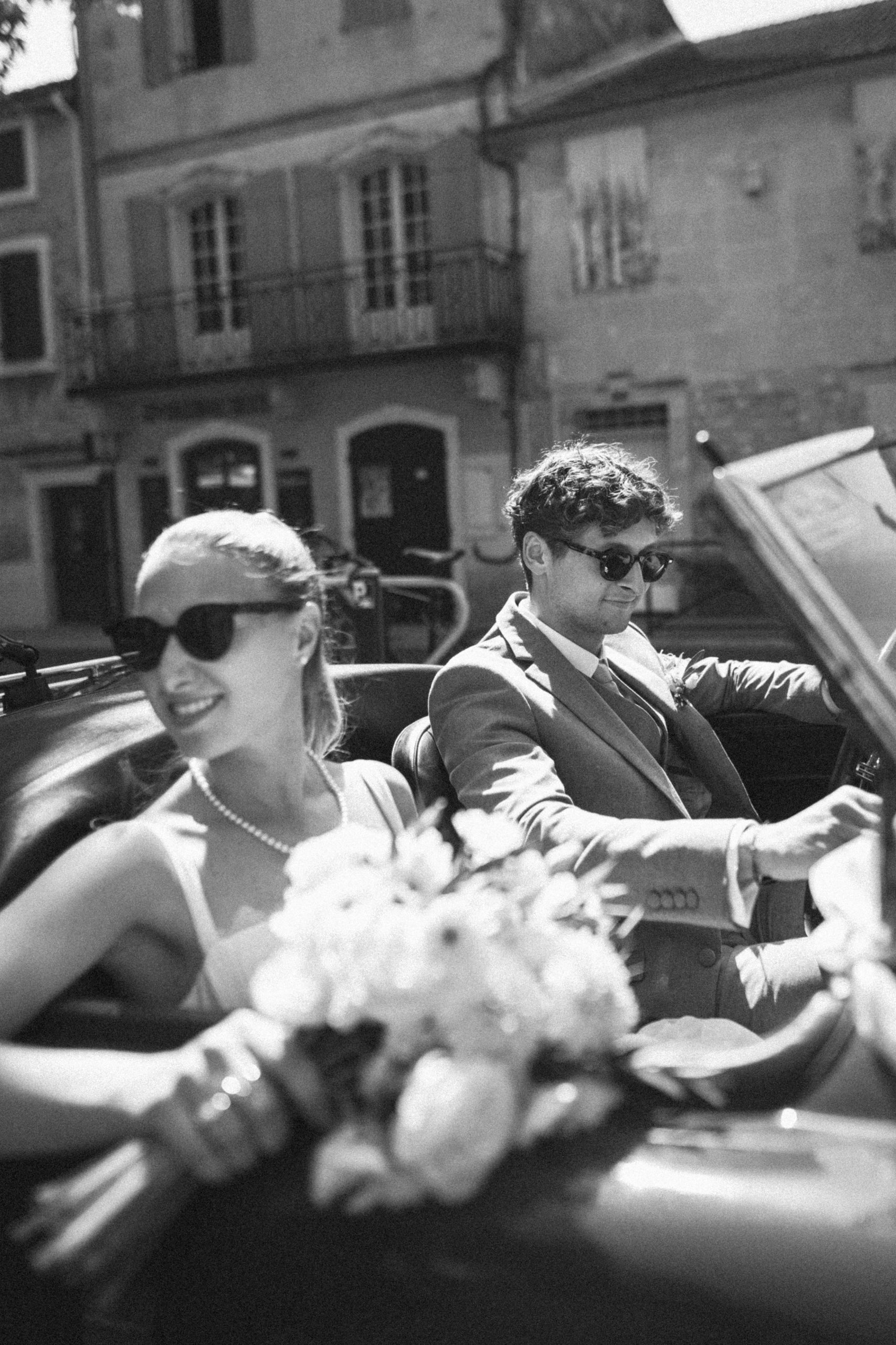 wedding couple in vintage car Provence editorial documentary style natural moment
